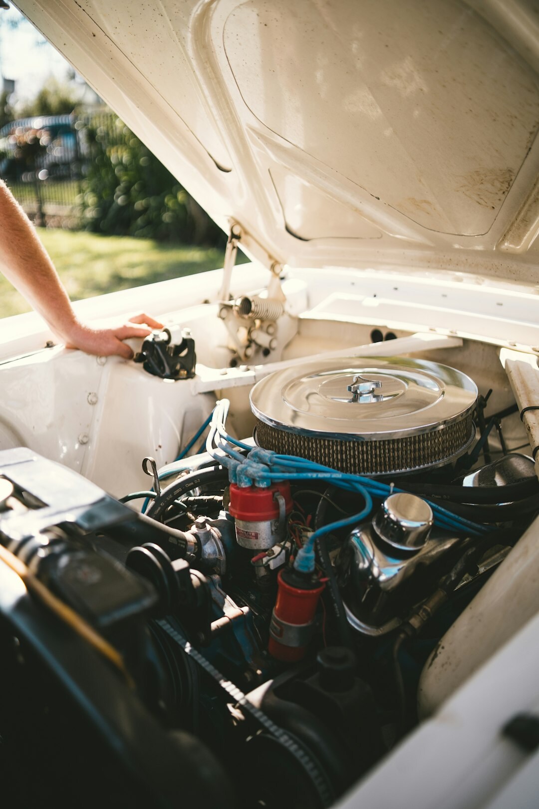mechanic inspecting car engine